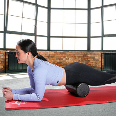 CanDo Foam Roller - Black Composite - Extra Firm - 6" x 18" - Round — for Flexibility and Muscle Recovery